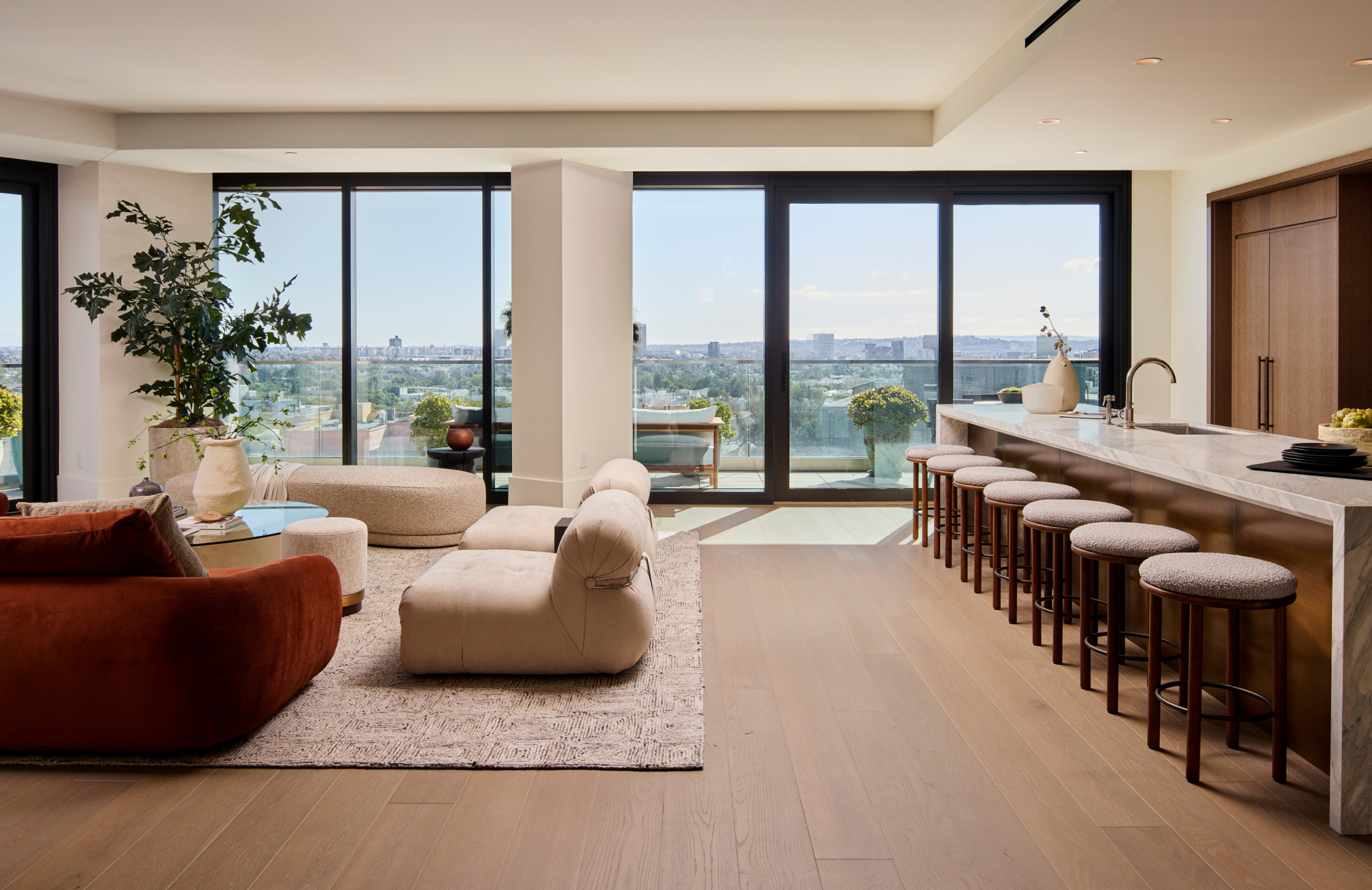 Spacious modern living and dining area with ocean view and natural light